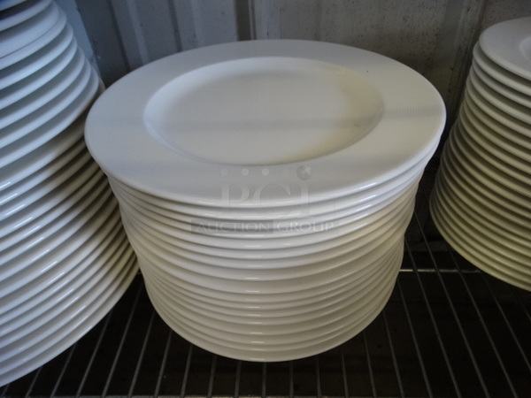 18 White Ceramic Plates. 9.5x9.5x1. 18 Times Your Bid!
