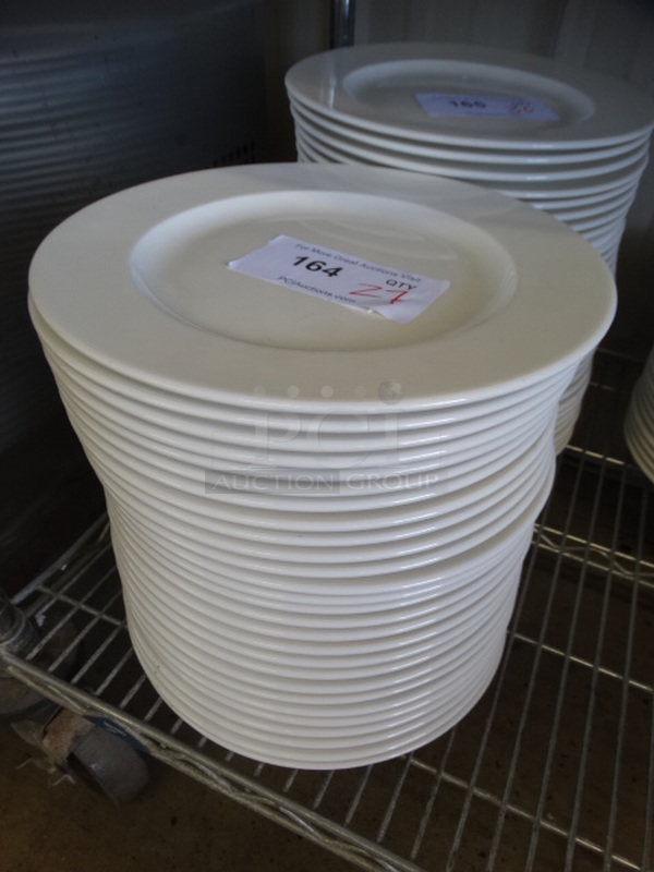 27 White Ceramic Plates. 11x11x1. 27 Times Your Bid!