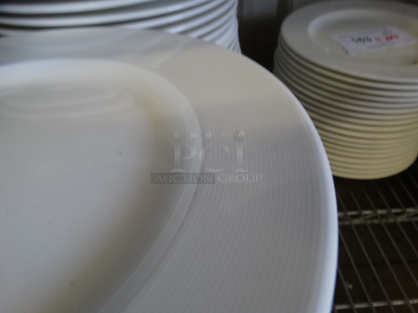 27 White Ceramic Plates. 11x11x1. 27 Times Your Bid! - Image 4 of 5