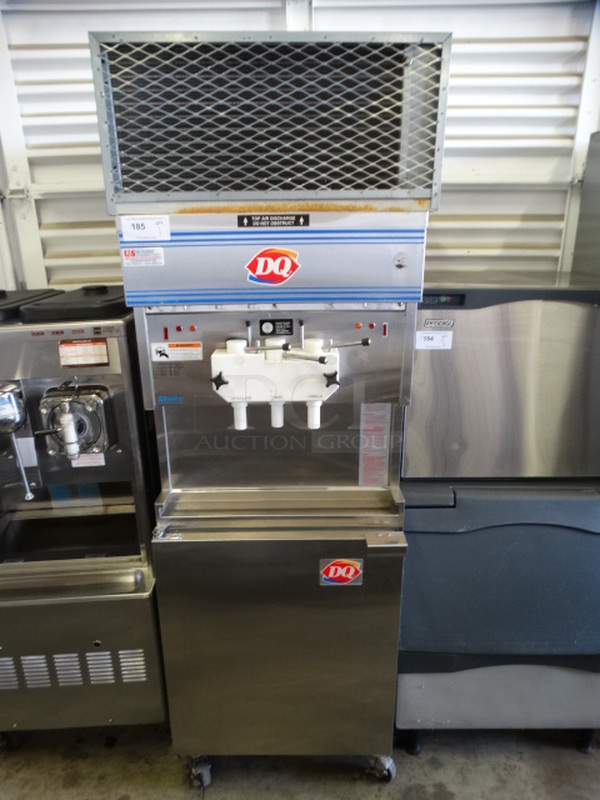 FANTASTIC! Duke Model 959RMT-432 Stainless Steel Commercial Air Cooled 2 Flavor w/ Twist Soft Serve Ice Cream Machine on Commercial Casters. 208/230 Volts, 3 Phase. 26x37x81