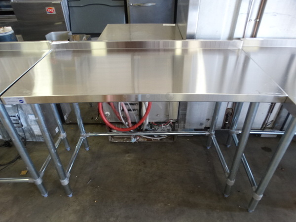 BRAND NEW IN BOX! Serv Ware Model T2448CWP-4-T-OB Stainless Steel Commercial Table w/ Backsplash. Stock Picture - Unit Is Disassembled In Box. 48x24x36 - Image 1 of 5