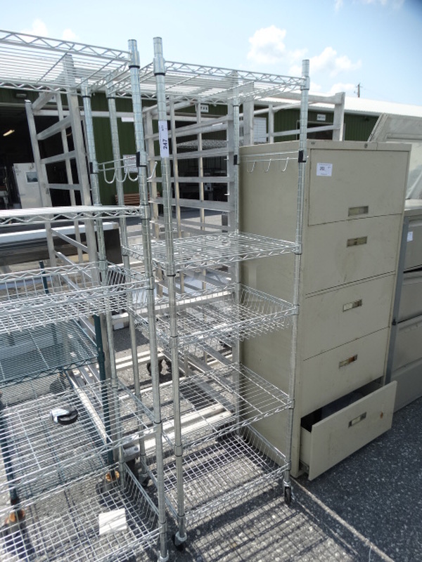 Chrome Finish 5 Tier Metro Shelving Rack on Commercial Casters. 24x18x75. BUYER MUST DISMANTLE. PCI CANNOT  DISMANTLE FOR SHIPPING. PLEASE CONSIDER FREIGHT CHARGES.  - Image 1 of 3