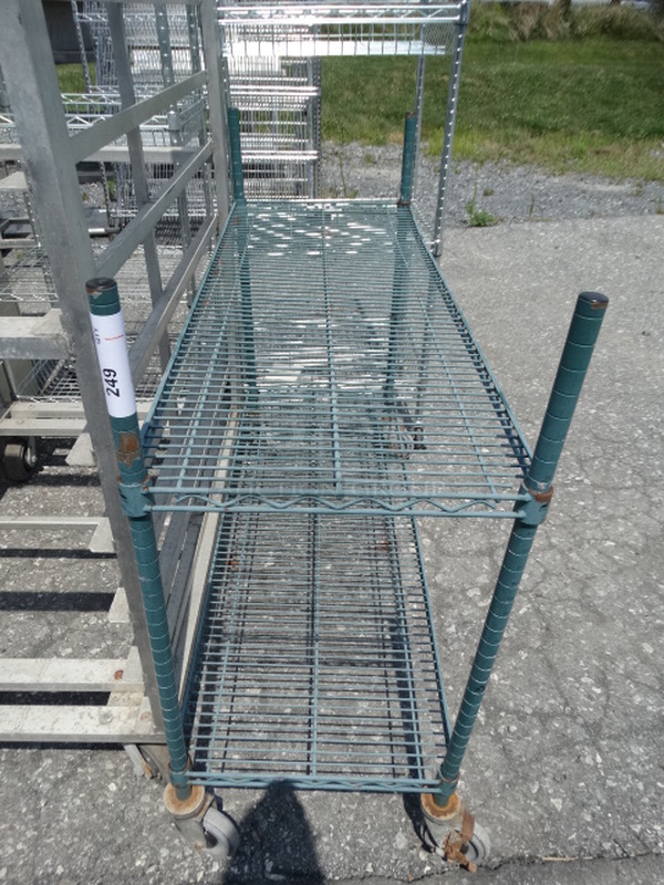 Green Finish 2 Tier Metro Shelving Unit on Commercial Casters. 48x18x40. BUYER MUST DISMANTLE. PCI CANNOT  DISMANTLE FOR SHIPPING. PLEASE CONSIDER FREIGHT CHARGES. 