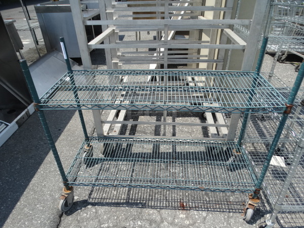 Green Finish 2 Tier Metro Shelving Unit on Commercial Casters. 48x18x40. BUYER MUST DISMANTLE. PCI CANNOT  DISMANTLE FOR SHIPPING. PLEASE CONSIDER FREIGHT CHARGES.  - Image 2 of 2