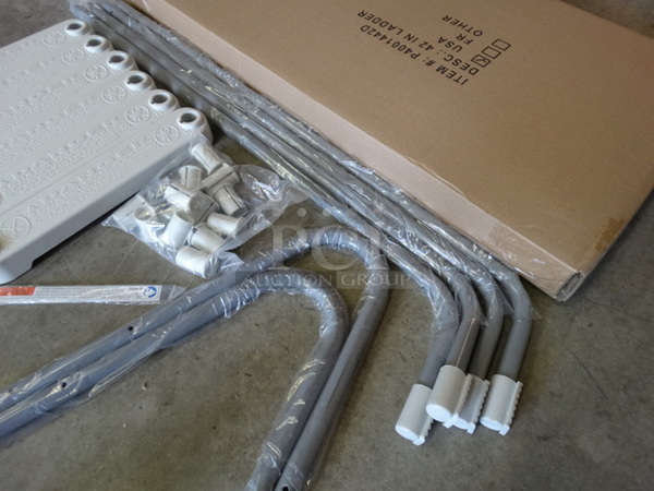 IN ORIGINAL BOX! Pieces to Gray Metal and Tan Poly Ladder.  - Image 5 of 5