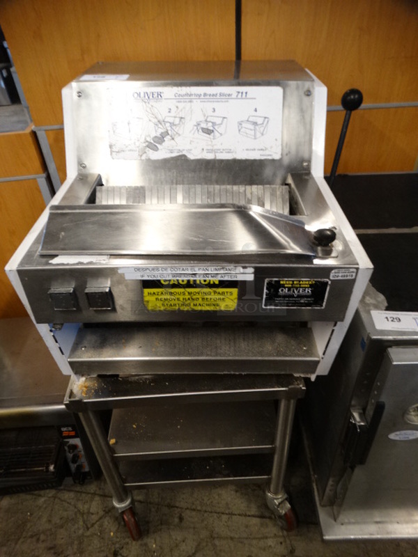 AMAZING! Oliver Model 711 Metal Commercial Countertop Bread Loaf Slicer w/ Stainless Steel Equipment Stand on Commercial Casters. 115 Volts, 1 Phase. 25x28x48. Tested and Working!