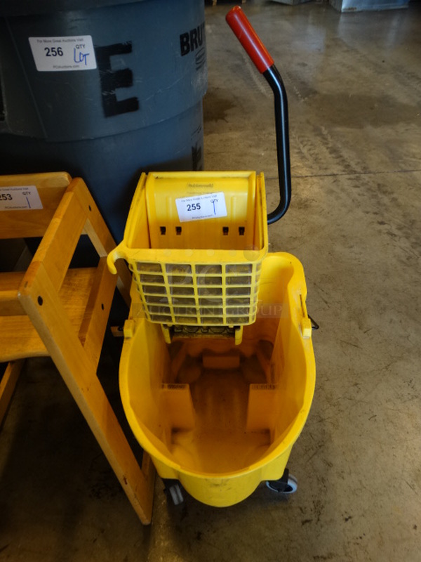 Rubbermaid Poly Yellow Mop Bucket w/ Wringing Attachment on Casters. 16x22x36
