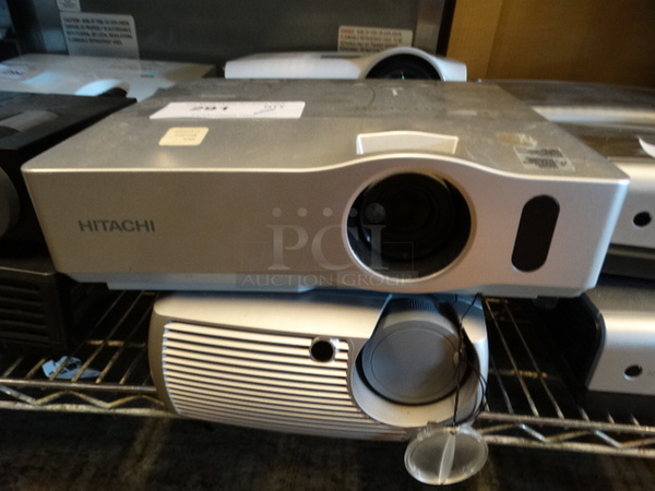 2 Projectors; Hitachi Model CP-X301 and InFocus Model X2. 13.5x11x4, 9.5x13x4. 2 Times Your Bid!
