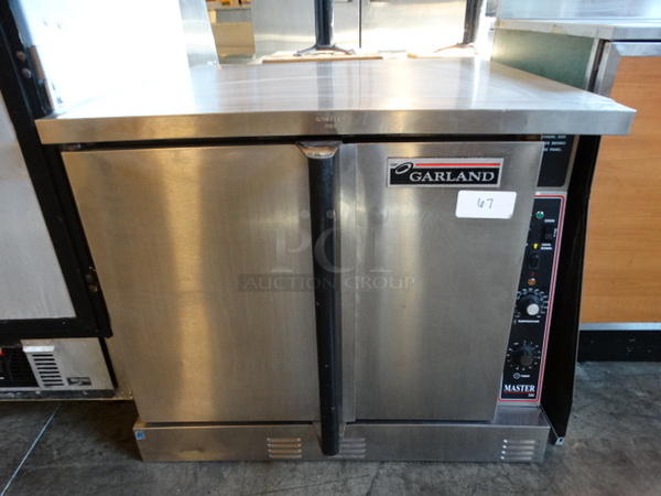 AWESOME! Garland Master 200 Stainless Steel Commercial Gas Powered Full Size Convection Oven w/ Thermostatic Controls and Metal Oven Racks. 38x44x32