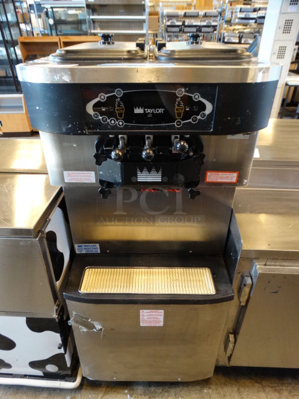 GORGEOUS! 2007 Taylor Model C713-27 Stainless Steel Commercial Floor Style 2 Flavor w/ Twist Soft Serve Ice Cream Machine on Commercial Casters. 208-230 Volts, 1 Phase. 25x40x60