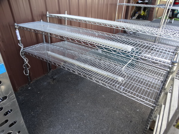 Chrome Finish 2 Tier Metro Shelving Unit. 60x14x32. BUYER MUST DISMANTLE. PCI CANNOT  DISMANTLE FOR SHIPPING. PLEASE CONSIDER FREIGHT CHARGES. 