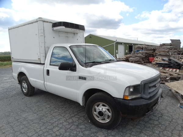 2003 Ford F250 XL Super Duty Pick Up Truck w/ Sumpreme 30S Reefer Attachment in Truck Bed. VIN 1FTNF20L03EC08610. Odometer Reads 131,028. Title is Free and Clear. Vehicle Runs and Drives! Reefer Attachment is Tested and Working! See Lots 5-6 For Additional Pictures!