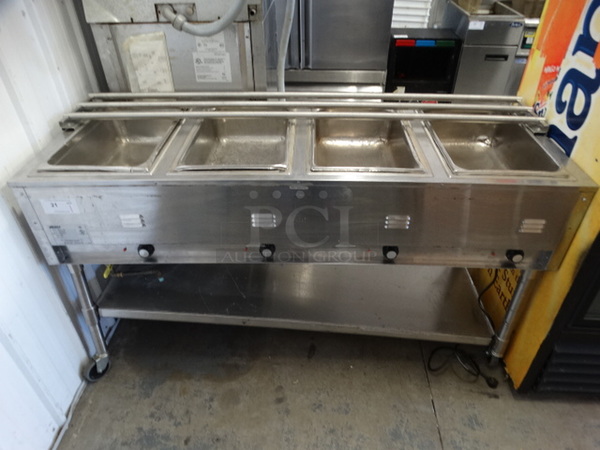 NICE! Eagle Model SPHT4-208 Stainless Steel Commercial 4 Well Electric Powered Steam Table w/ Undershelf on Commercial Casters. 208 Volts, 1 Phase. 63.5x24x36