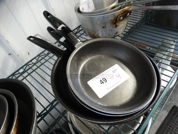 4 Metal Skillets. Includes 14x8x2. 4 Times Your Bid!