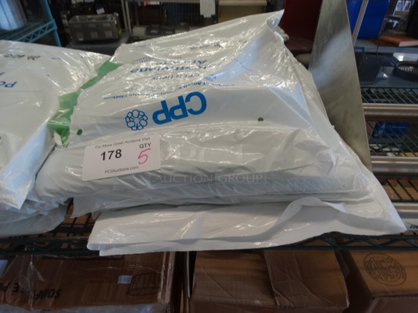 5 Bags of Polyethylene Aprons. 5 Times Your Bid!