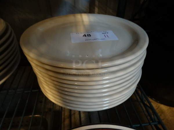 11 White Ceramic Plates. 10.5x10.5x1. 11 Times Your Bid!