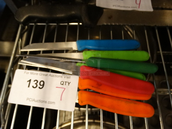 7 Metal Knives w/ Colorful Handles. 8