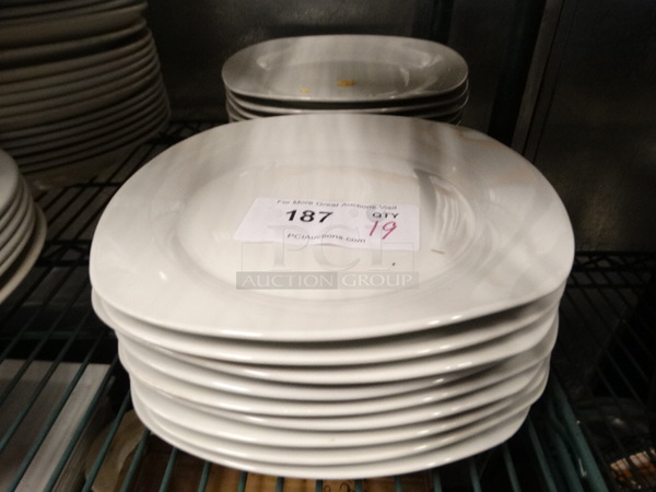 19 White Ceramic Plates. 10x10x1. 19 Times Your Bid!