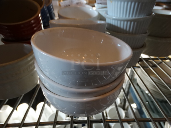 12 White Ceramic Bowls. 4x4x2. 12 Times Your Bid!