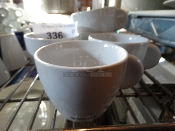 11 White Ceramic Mugs. 4x3x2.5. 11 Times Your Bid!
