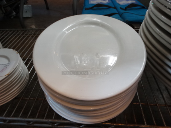13 White Ceramic Plates. 13.5x10.5x1. 13 Times Your Bid!