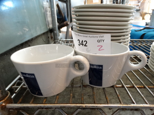 2 White Ceramic Mugs. 5x4x3. 2 Times Your Bid!