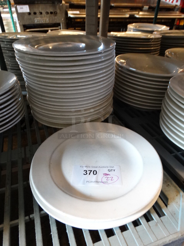 22 White Ceramic Plates. 11x11x1. 22 Times Your Bid!