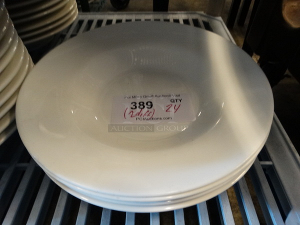 24 White Ceramic Pasta Plates. 2 Plates Are Mildly Different. 11x11x2. 24 Times Your Bid!