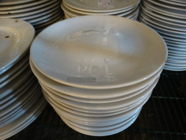 22 White Ceramic Plates. 11.5x11.5x1. 22 Times Your Bid!