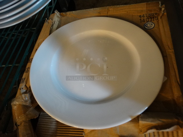 11 BRAND NEW IN BOX! White Ceramic Plates. 11x11x1. 11 Times Your Bid!