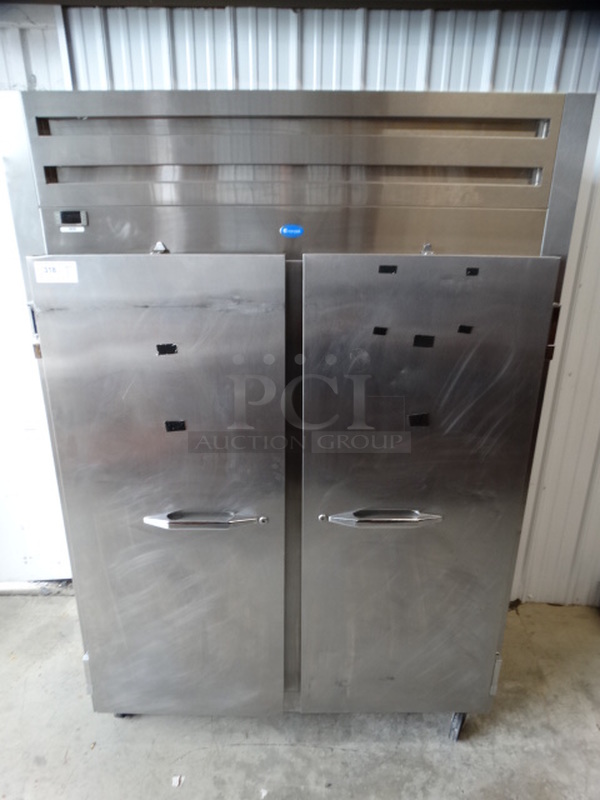 SWEET! Randell Model 2020F Stainless Steel Commercial 2 Door Reach In Freezer on Commercial Casters. 115 Volts, 1 Phase. 55x34x80. Could Not Test Due To Plug Style