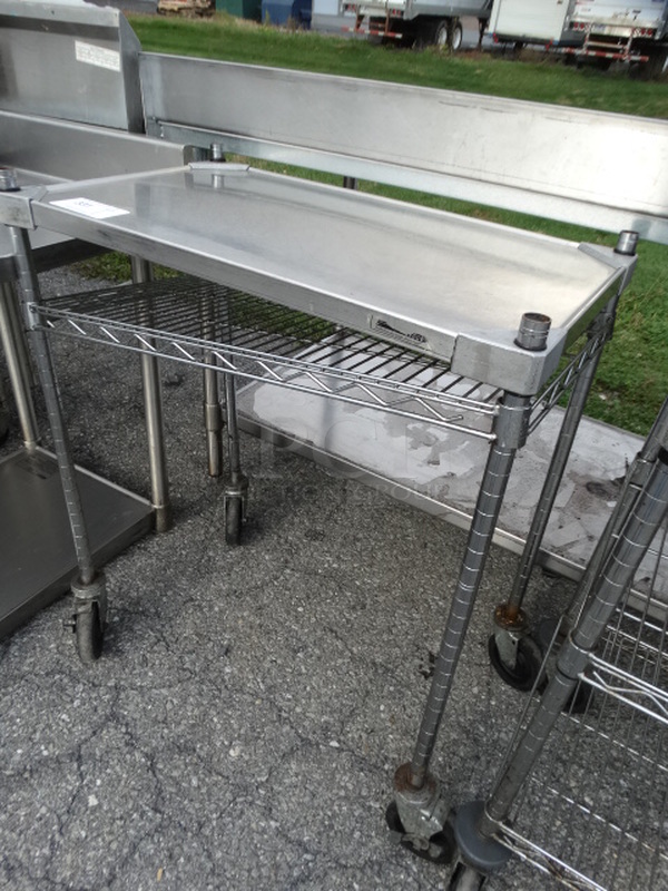 Chrome Finish 2 Tier Metro Shelving Unit on Commercial Casters. 30x18x35. BUYER MUST DISMANTLE. PCI CANNOT  DISMANTLE FOR SHIPPING. PLEASE CONSIDER FREIGHT CHARGES.  - Image 2 of 3