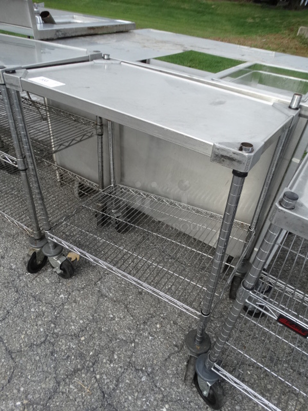 Chrome Finish 2 Tier Metro Shelving Unit on Commercial Casters. 30x18x35. BUYER MUST DISMANTLE. PCI CANNOT  DISMANTLE FOR SHIPPING. PLEASE CONSIDER FREIGHT CHARGES.  - Image 2 of 5