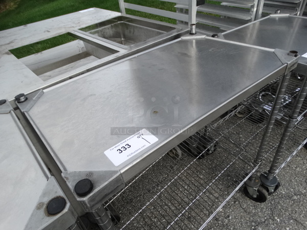Chrome Finish 2 Tier Metro Shelving Unit on Commercial Casters. 30x18x35. BUYER MUST DISMANTLE. PCI CANNOT  DISMANTLE FOR SHIPPING. PLEASE CONSIDER FREIGHT CHARGES.  - Image 4 of 5