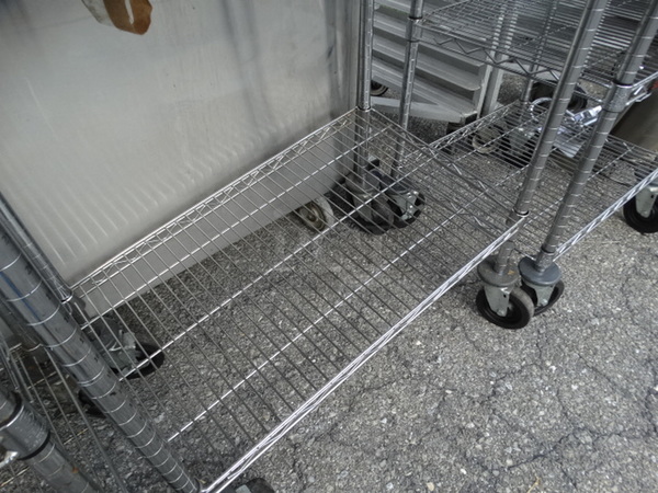 Chrome Finish 2 Tier Metro Shelving Unit on Commercial Casters. 30x18x35. BUYER MUST DISMANTLE. PCI CANNOT  DISMANTLE FOR SHIPPING. PLEASE CONSIDER FREIGHT CHARGES.  - Image 5 of 5
