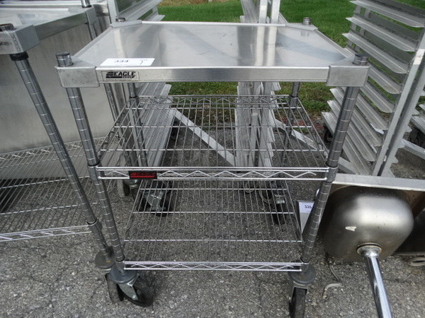 Chrome Finish 2 Tier Metro Shelving Unit on Commercial Casters. 24x18x33.5. BUYER MUST DISMANTLE. PCI CANNOT  DISMANTLE FOR SHIPPING. PLEASE CONSIDER FREIGHT CHARGES.  - Image 1 of 4