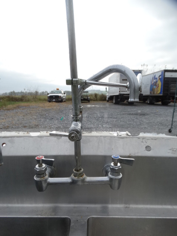Stainless Steel Commercial 3 Bay Sink w/ Left Side Drainboard, Faucets, Handles and Spray Nozzle Attachment. 105x30x43. Bays 1824x12. Drainboard 22x27x2 - Image 8 of 9
