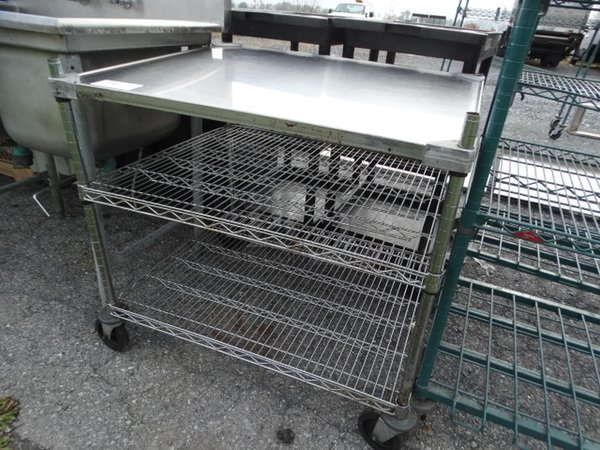 Chrome Finish 3 Tier Shelving Unit on Commercial Casters. 36x30x35. BUYER MUST DISMANTLE. PCI CANNOT  DISMANTLE FOR SHIPPING. PLEASE CONSIDER FREIGHT CHARGES.  - Image 2 of 4