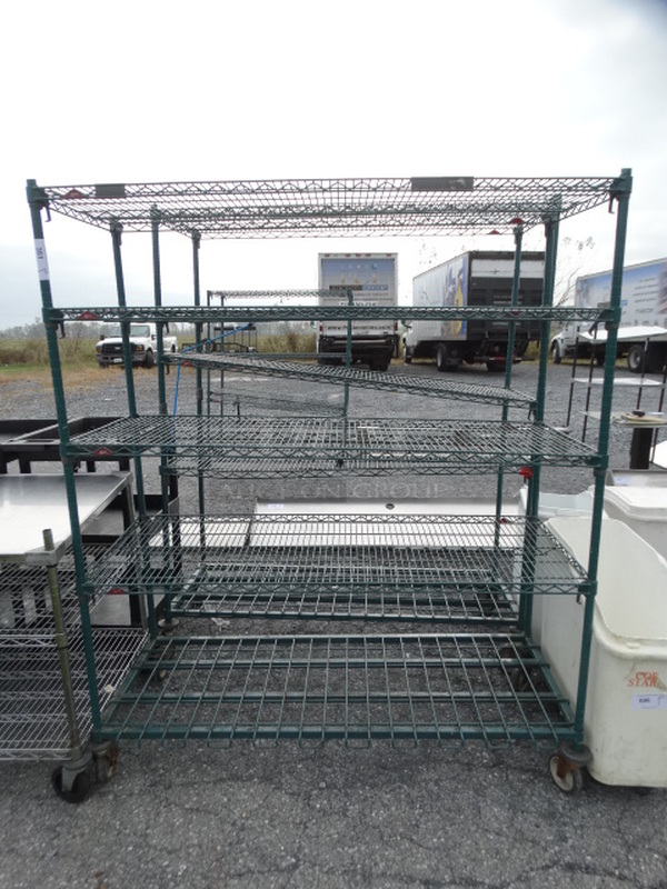 Metro Green Finish 5 Tier Shelving Unit on Commercial Casters. 60x24x72. BUYER MUST DISMANTLE. PCI CANNOT  DISMANTLE FOR SHIPPING. PLEASE CONSIDER FREIGHT CHARGES.  - Image 1 of 4