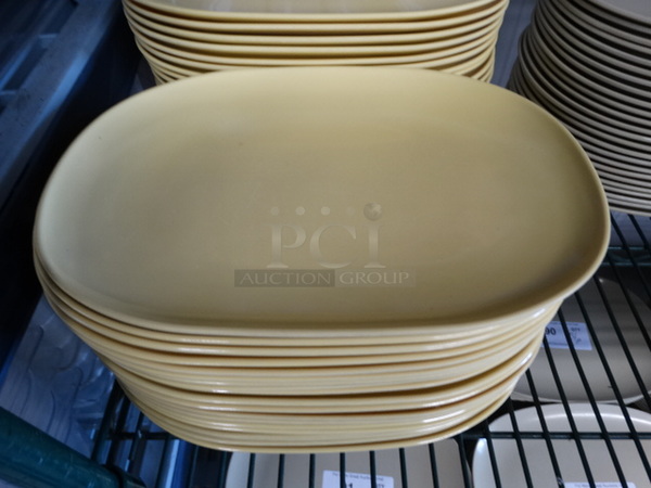 36 Carlisle Yellow Poly Plates. 12x8.25x1. 36 Times Your Bid!