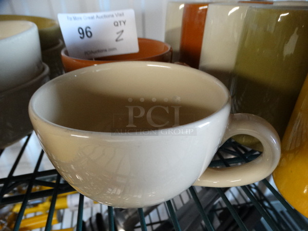 2 Brown and Cream Colored Ceramic Mugs. 6x4.5x3. 2 Times Your Bid!