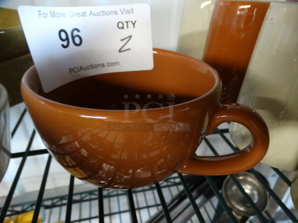 2 Brown and Cream Colored Ceramic Mugs. 6x4.5x3. 2 Times Your Bid! - Image 2 of 3