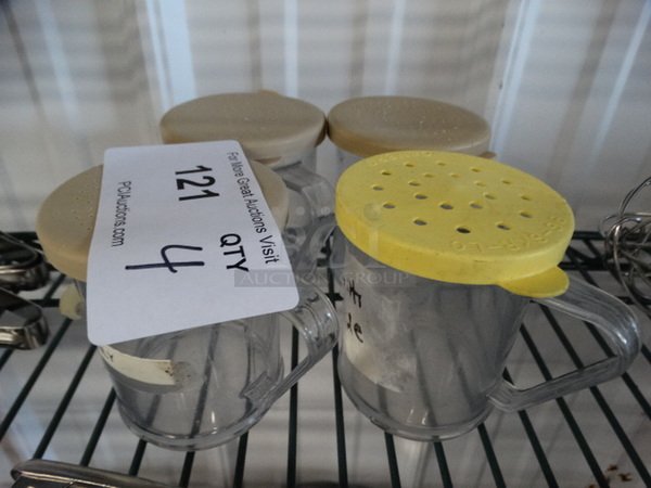 4 Poly Clear Seasoning Shakers. 4.5x3x3.5. 4 Times Your Bid! - Image 1 of 4