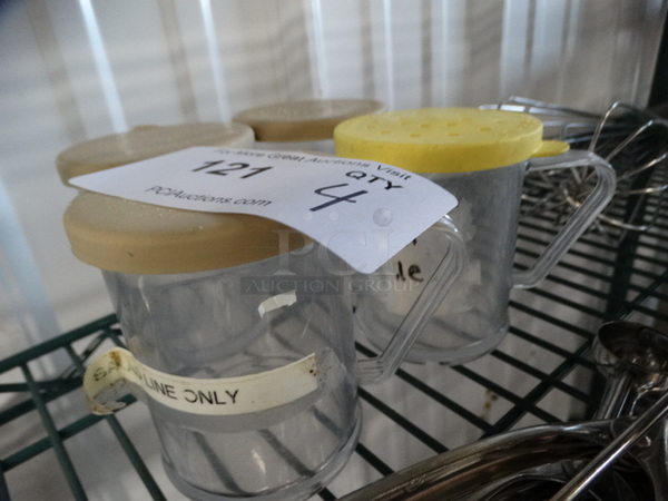 4 Poly Clear Seasoning Shakers. 4.5x3x3.5. 4 Times Your Bid! - Image 2 of 4