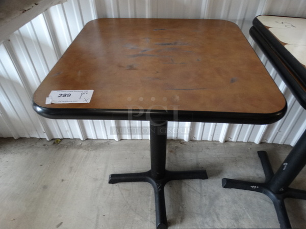 Brown Table on Black Metal Table Base. 24x24x30