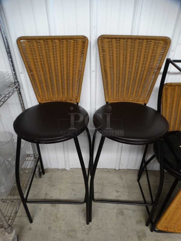 2 Bar Height Chairs w/ Wicker Style Backrest and Brown Seat Cushion on Black Metal Frame. 18x18x44. 2 Times Your Bid! - Image 1 of 4