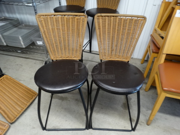 2 Dining Chairs w/ Wicker Style Backrest and Brown Seat Cushion on Black Metal Frame. 18x18x34. 2 Times Your Bid!