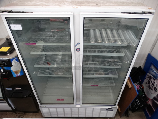 WOW! Master Bilt Model BLG-52HD Metal Commercial 2 Door Reach In Freezer Merchandiser w/ Poly Coated Racks on Commercial Casters. 115 Volts, 1 Phase. 56x33x81. Cannot Test Due To Plug Style 