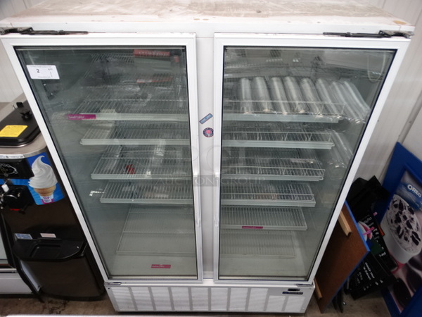 WOW! Master Bilt Model BLG-52HD Metal Commercial 2 Door Reach In Freezer Merchandiser w/ Poly Coated Racks on Commercial Casters. 115 Volts, 1 Phase. 56x33x81. Cannot Test Due To Plug Style  - Image 1 of 7