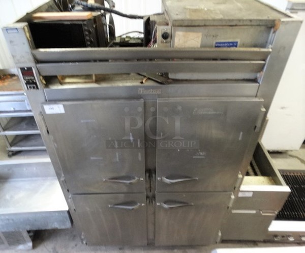 WOW! Traulsen Model RLT2-32NUT Stainless Steel Commercial 4 Half Size Door Reach In Freezer. 115/208 Volts, 1 Phase. Cannot Test - Unit Was Previously Hardwired